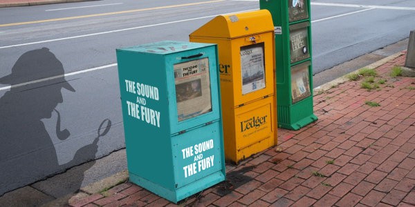 Newspaper stands on street 