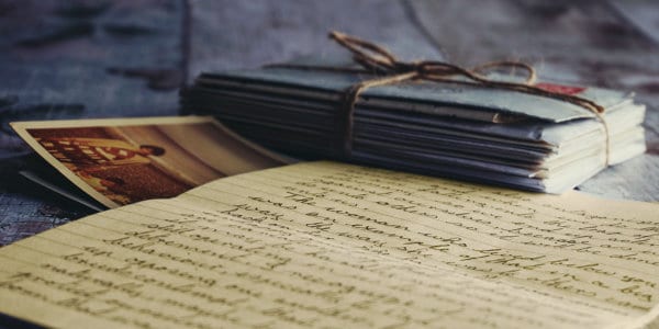 Old letter with stack of envelopes.