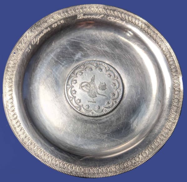 Silver teacup plate