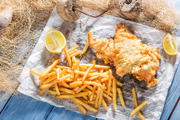 Fresh fish and chips served in paper