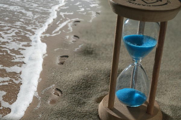 Time and footsteps in the sand