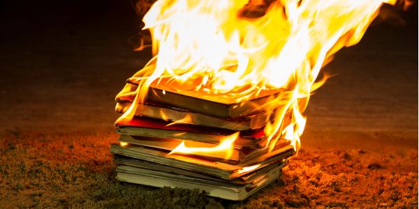 A pile of books, burning