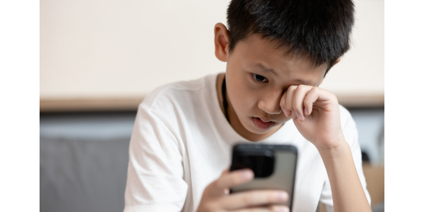 Boy holding phone